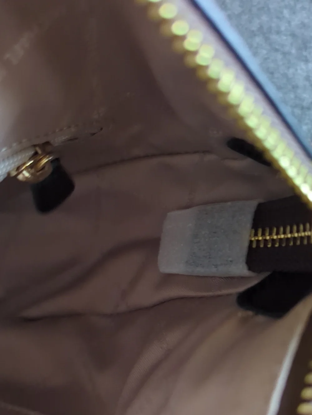 Michael Kors used inside